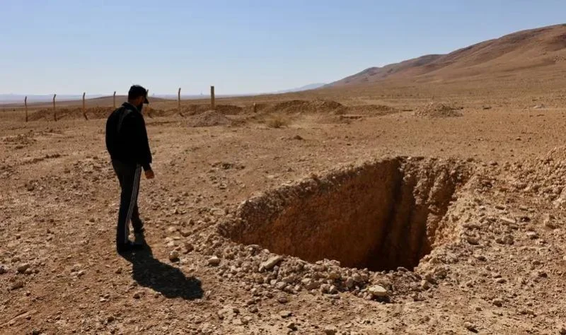 Unexpected evidence reveals details about the unearthing of a mass burial site from the Assad regime, alongside stringent security protocols.