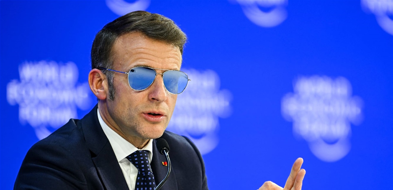 How Macron’s Glasses Generated Millions in Davos Profits