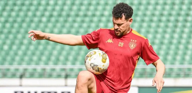 What delayed his appearance in the match between Esperance and the Financial Stadium?