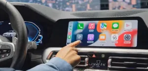 A new update to Apple CarPlay allows video playback while driving
