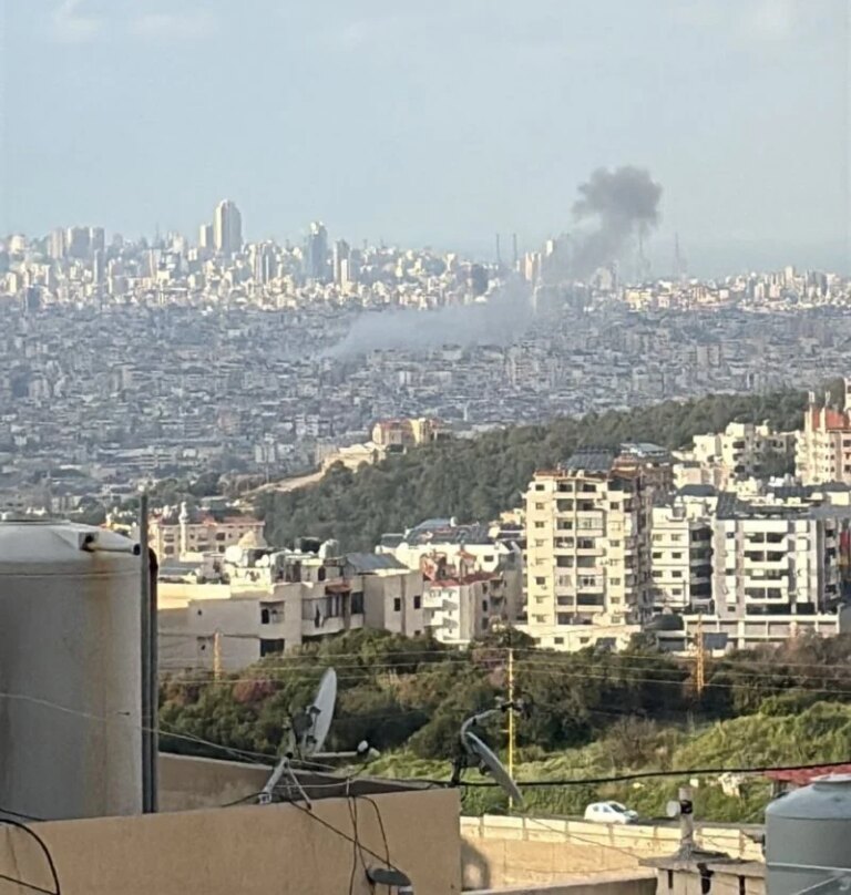 Israel threatens to escalate strikes, Hezbollah threatens to target infrastructure, and warns residents of the suburb