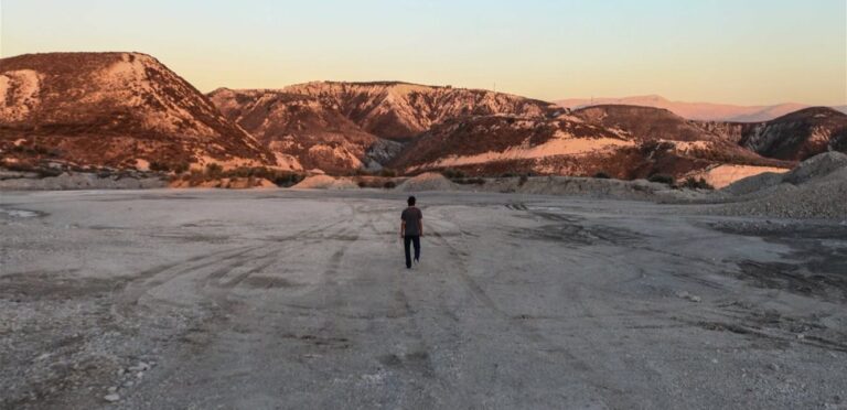 Mukhtar Badbhoun and activists denounce the decision to allow cement companies to continue dredging