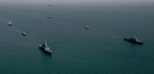 How does traffic differ between Bab al-Mandab and the Strait of Hormuz?